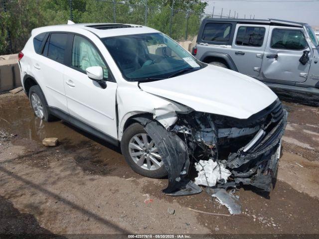  Salvage Mazda Cx
